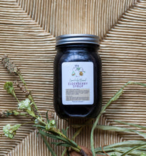 Load image into Gallery viewer, Essentially Blessed Elderberry Syrup is made with only organic elderberries, raw and local honey and immune-supporting essential oils. There are no added sugars, fillers or unnecessary ingredients. Reduces cold and flu and decreases the severity of symptoms. Proven more beneficial than Tamiflu.