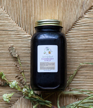 Load image into Gallery viewer, Essentially Blessed Elderberry Syrup is made with only organic elderberries, raw and local honey and immune-supporting essential oils. There are no added sugars, fillers or unnecessary ingredients. Reduces cold and flu and decreases the severity of symptoms. Proven more beneficial than Tamiflu.